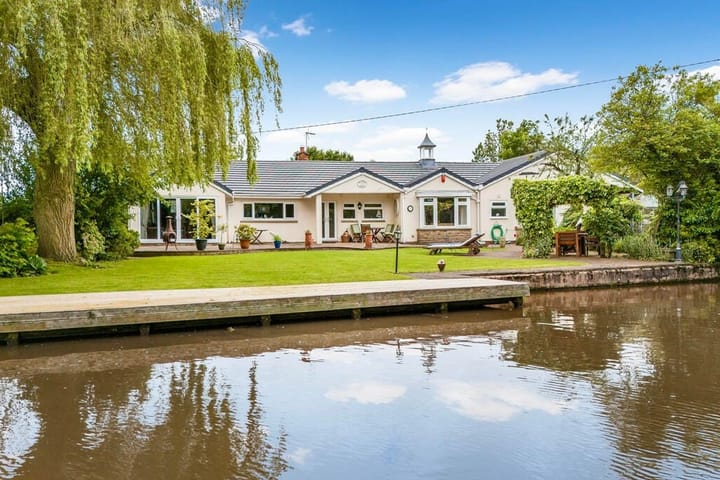 A beautiful canalside home with mooring and covered slipway